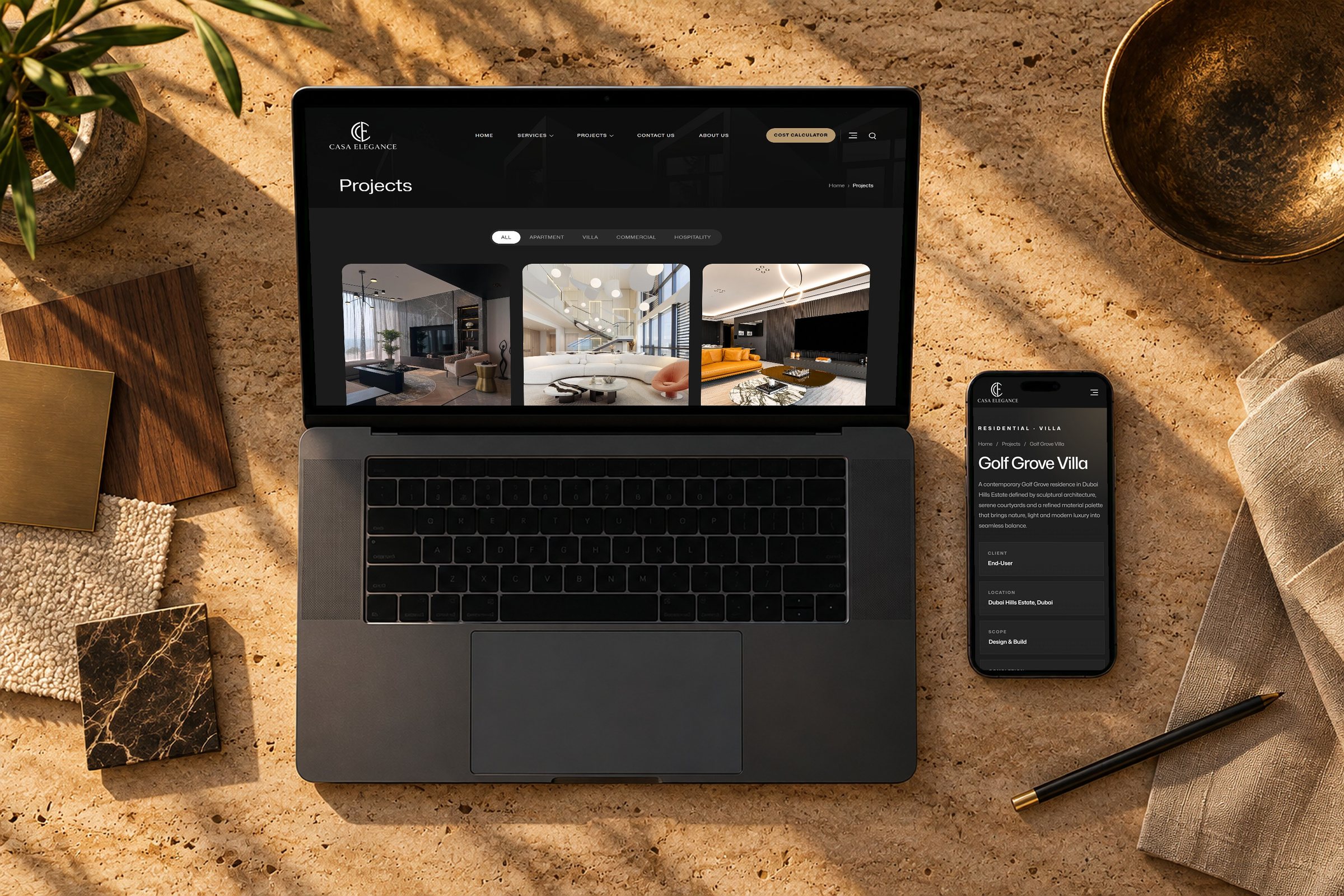 Projects page on a laptop and a project story on a phone, on a travertine desk