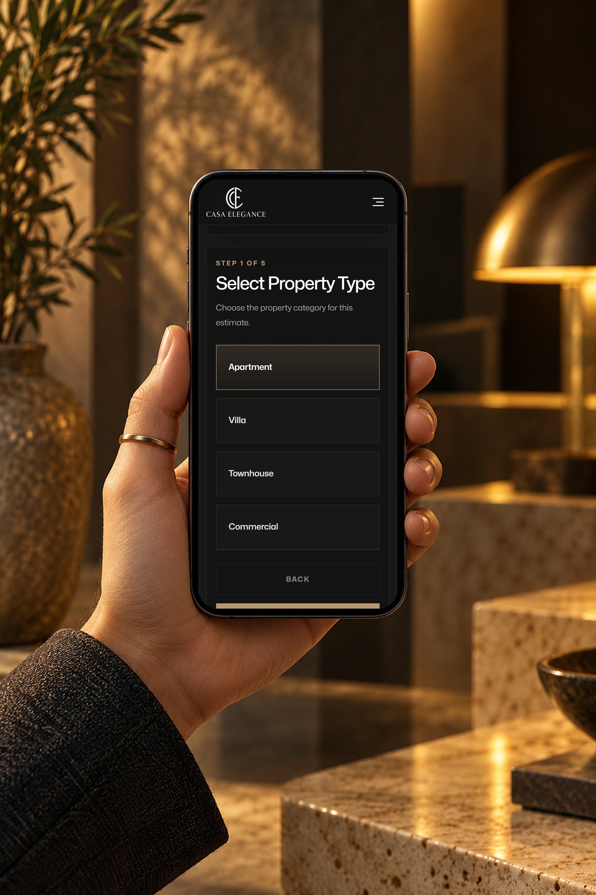 Calculator on a phone, held in hand